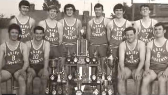 An early St. Vincent's team with their trophies and cups